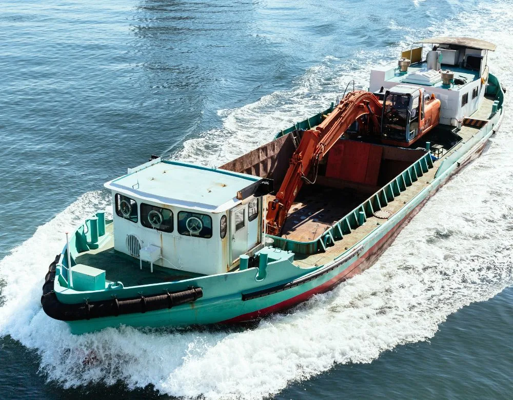 Workboat Dredger in action.